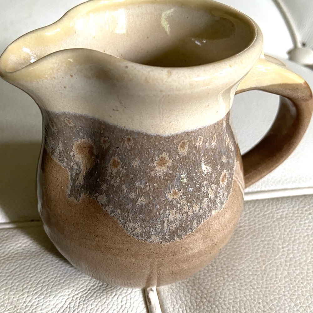 Vintage pottery creamer or small pitcher tan glaze good condition